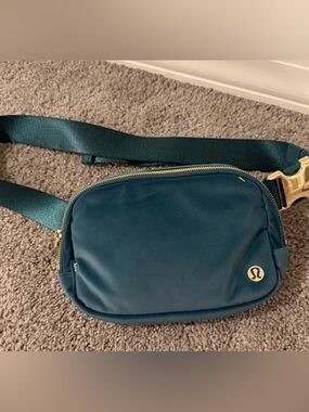 lululemon athletica Deep Teal Belt Bag with Gold Hardware